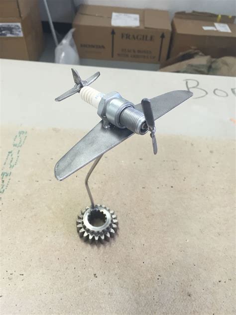 Spark Plug Plane Metal Art Diy Metal Art Projects Scrap Metal Art