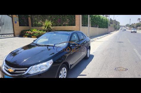 Optra Chevrolet 2023 Dokki Black 4941885 - Car for sale : Hatla2ee