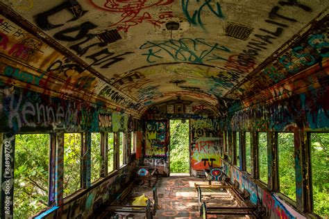 An abandoned train with graffiti Stock Photo | Adobe Stock