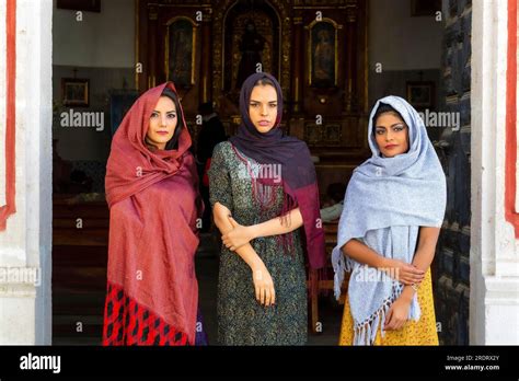 Three Gorgeous Hispanic Brunette Models Pose Outdoors In A Catholic