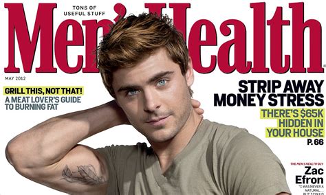 Zac Efron shows off his touched-up feather tattoo on his incredibly ...