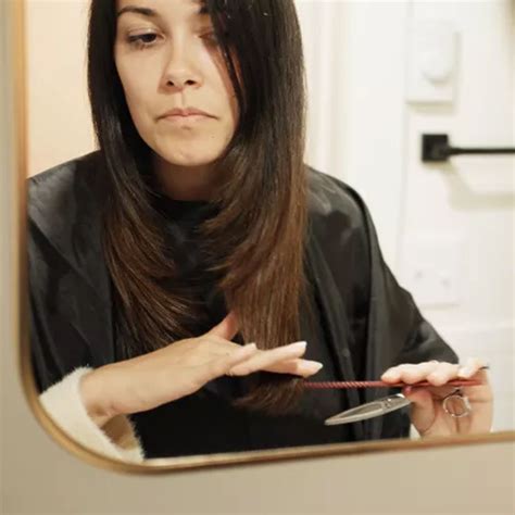 Top stylists explain how to cut face framing layers with bangs 19