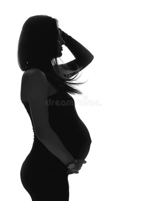 Pregnant Woman Silhouette On A White Background Text Space Stock Photo