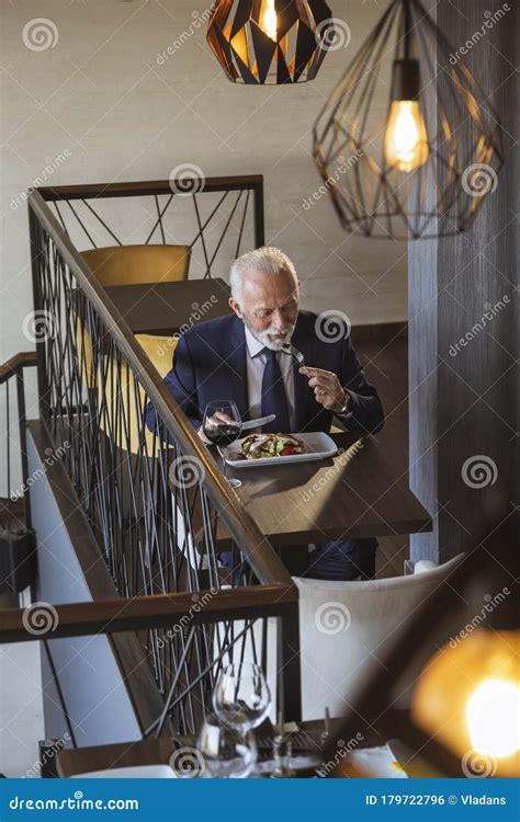 Senior Businessman Taking A Lunch Break Stock Photo Image Of