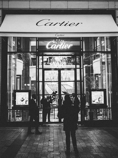 HD wallpaper: person standing front of Cartier signage, communication ...