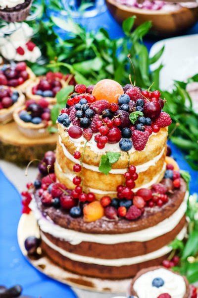 Naked Wedding Cake With Berries Stock Photo By Shebeko 79285958