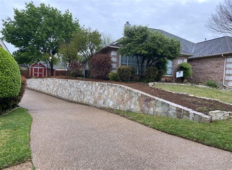 Replaced Wood Cross Tie Retaining Wall With Milsap Stone In Bedford