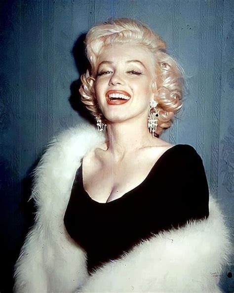 Marilyn Monroe In Black Dress And White Fur Stoler Smiling At The