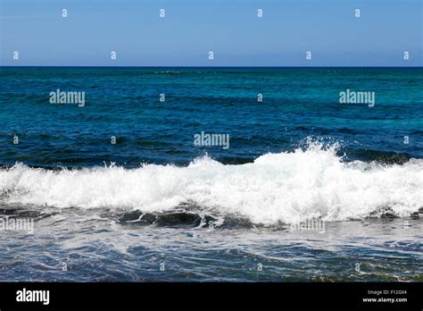 Rough ocean waves on shore Stock Photo - Alamy