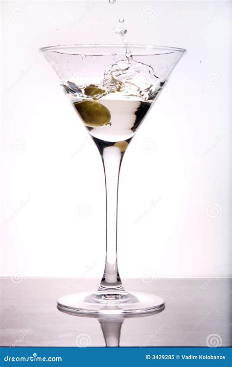 Olive Splashing Into Martini Stock Image Image Of Green Beverage