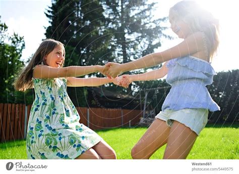 Two Little Girls Best Friends Holding Hands