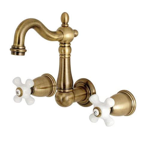 Kingston Brass Heritage 2 Handle Wall Mount Bathroom Faucet In Antique Brass Hks1223px The