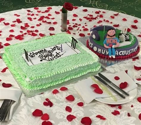 PHOTOS: Virat Kohli gets face full of cake - Rediff Cricket