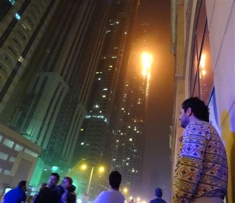 Photos and Video for Massive fire erupts at the Torch tower in Dubai ...