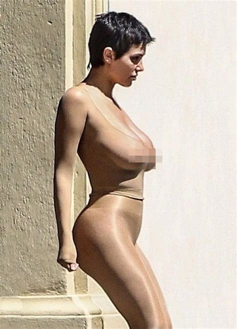 Kanye West S Wife Bianca Censori Covers Chest As She Slips Into