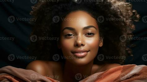 Beautiful African American Woman With Afro Hairstyle And Plaid