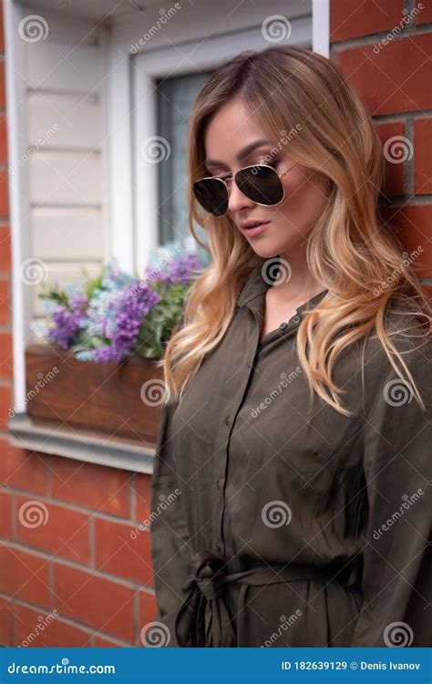 High Fashion Look Glamour Lifestyle Blonde Girl Outdoors Outdoors In Black Glasses Stock