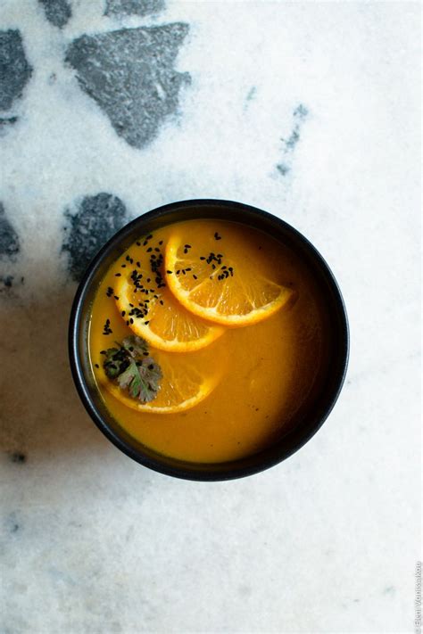 Carrot And Orange Soup Nigella Seeds Black Bowl Coriander Leaves Vegetable Sides Orange