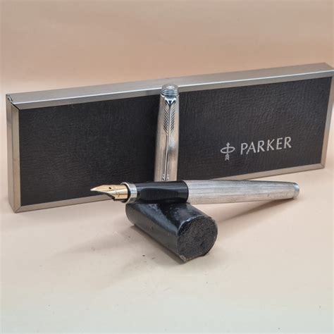 stylo parker   tick clock