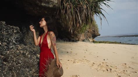 Sensual Lady In Red Dress Posing On The Beach Mixed Race Woman Model