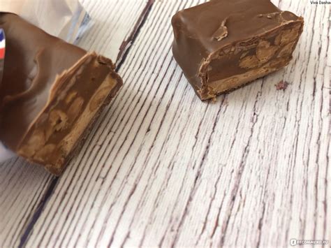 Шоколадный батончик Mars SNICKERS с жареным арахисом, карамелью и нугой ...