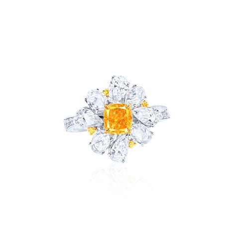 Fancy Vivid Yellow Orange Colored Diamond And Diamond