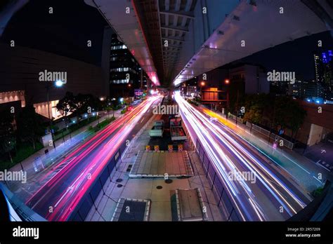 A Night Timelapse Of The Traffic Jam At The City Street In Tokyo Fish