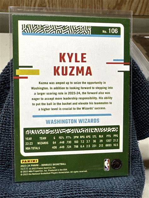 2023 24 Panini Donruss Kyle Kuzma Holo Green Laser Washington Wizards