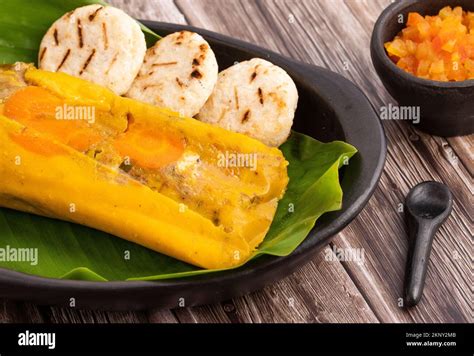 Traditional Colombian Tamales Wrapped In Green Banana Leaves Stock