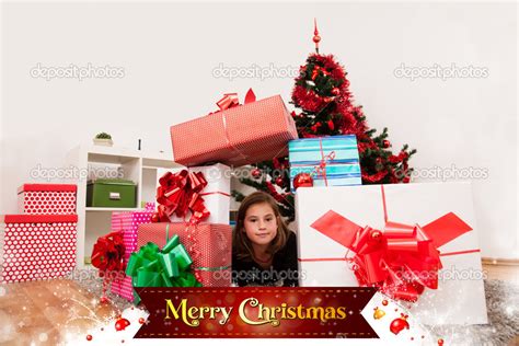 Kids with their christmas presents Stock Photo by ©ra2studio 13981423