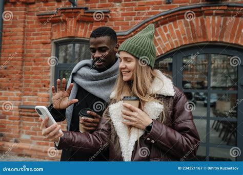 Two Good Opposite Sex Friends Taking Selfie On The Street Smiling