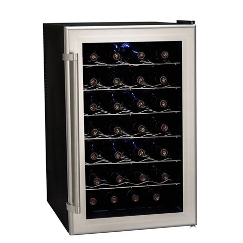 The Wine Cooler Has Many Bottles In It