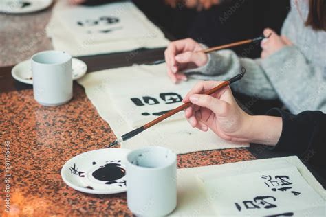 Chinese calligraphy lesson, group of kids learn and practicing ...