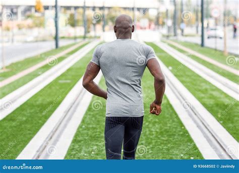 Attractive Black Man Running In Urban Background Stock Photo Image Of