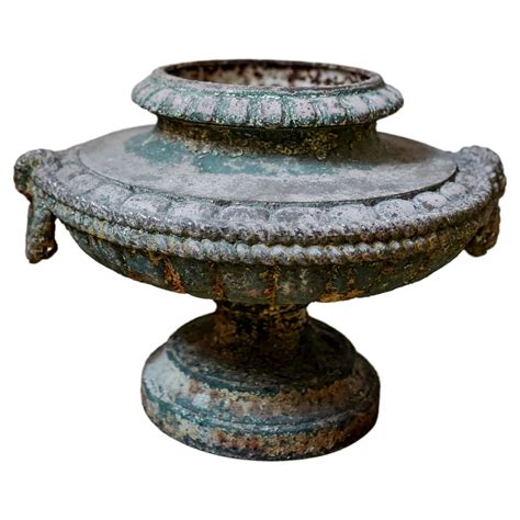 French Th Century Cast Iron Garden Urn With Dragon Handles For Sale