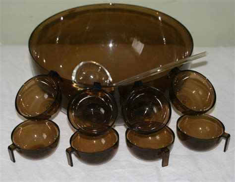 Guzzini - Table set large bowl, ladle and eight plastic - Catawiki