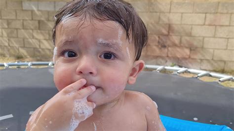Cute 1 Year Old Pakistani Asian Baby Boy is Enjoying in Water Tub
