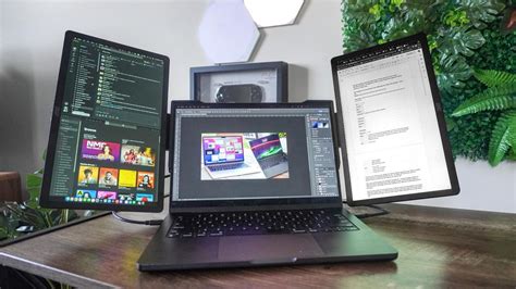 This tri-screen portable monitor setup has revolutionized my ...