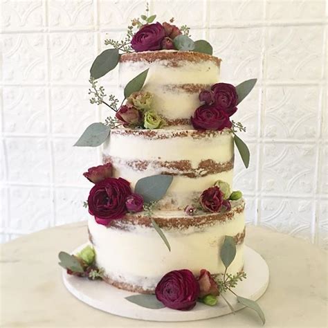 Naked Wedding Cake With Deep Red Roses