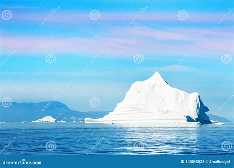 Big Iceberg in Ilulissat Icefjord at Sunset, Greenland Stock Photo ...