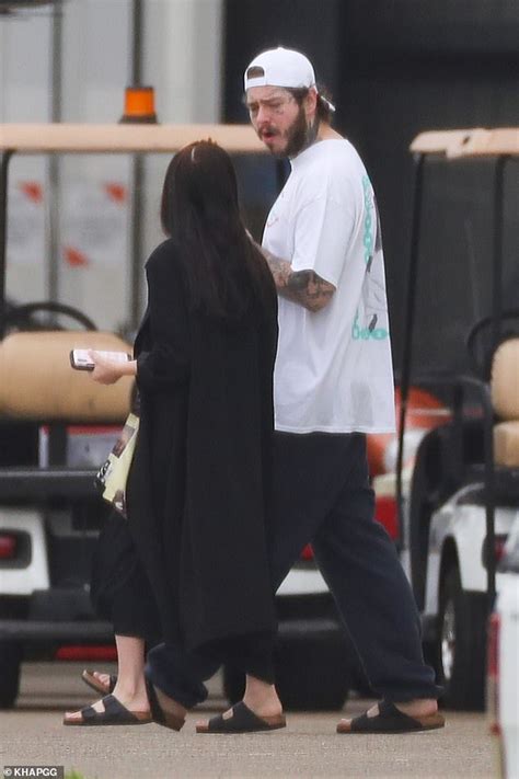 Post Malone Looks Loved Up With His Girlfriend Ashlen Diaz As The Pair Jet Out Of Sydney