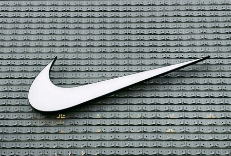 Nike Logo: Meaning, History, Design Influences, and Evolution - Boon ...