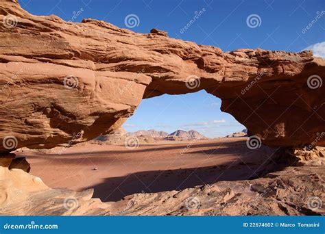 Through a Bridge in the Rock, Wadi Rum Stock Photo - Image of desert, highway: 22674602