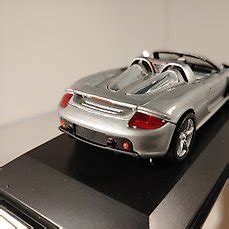 Porsche Museum 1:43 - Model car (1) - Porsche Carrera GT - - Catawiki