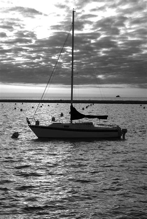 The Solitary Sailboat Photograph By Gregory Lafferty Fine Art America