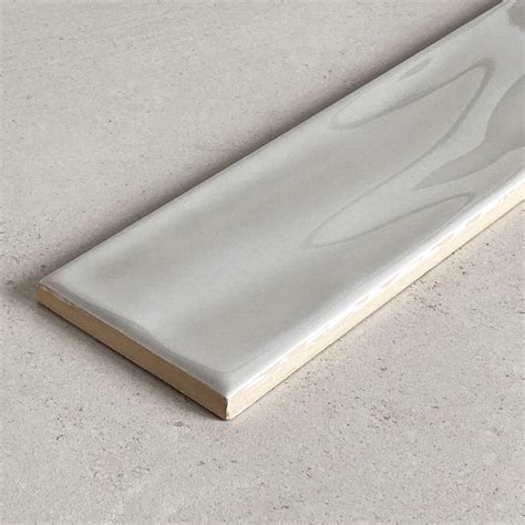 Wave Gray Gloss Pressed Edge Wall Tiles 75x300 The Tile Collective