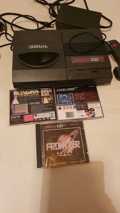 Commodore Amiga Cd32 - Console with games - Without original box - Catawiki