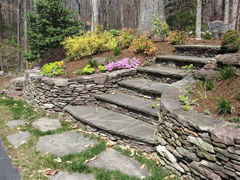 Curved Stacked Stone Retaining Walls And Stairs