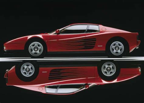 Download Stunning Red Ferrari Testarossa In Motion Wallpaper