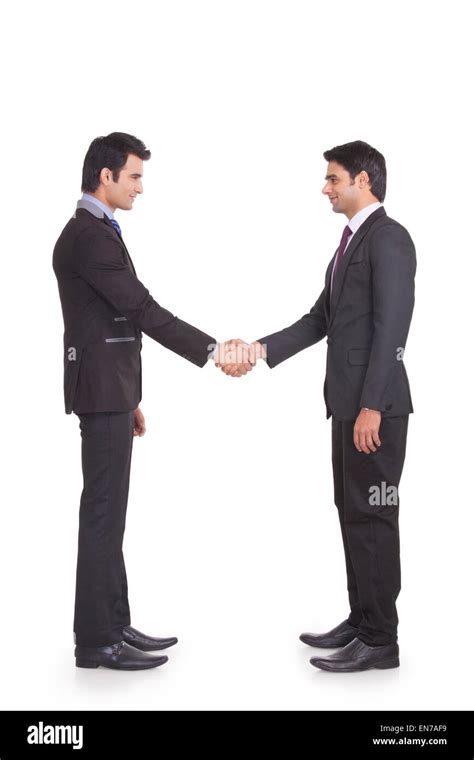 Two Businessmen Shaking Hands Stock Photo Alamy